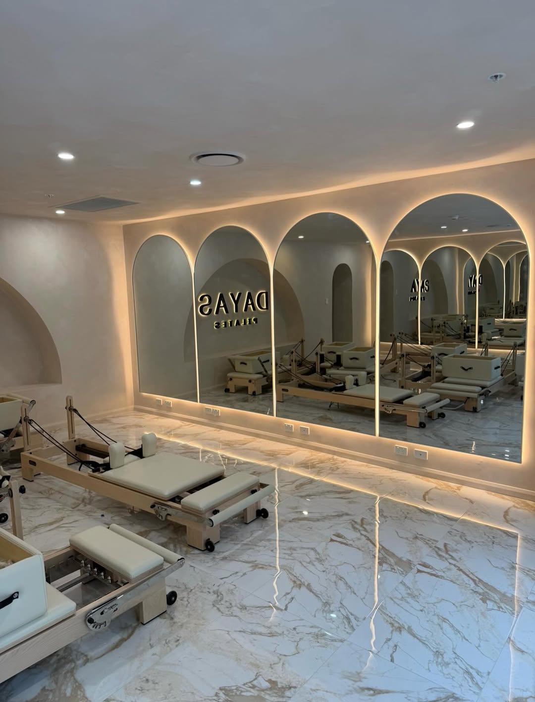 Arched mirror wall delivered and installed in a Sydney Pilates studio